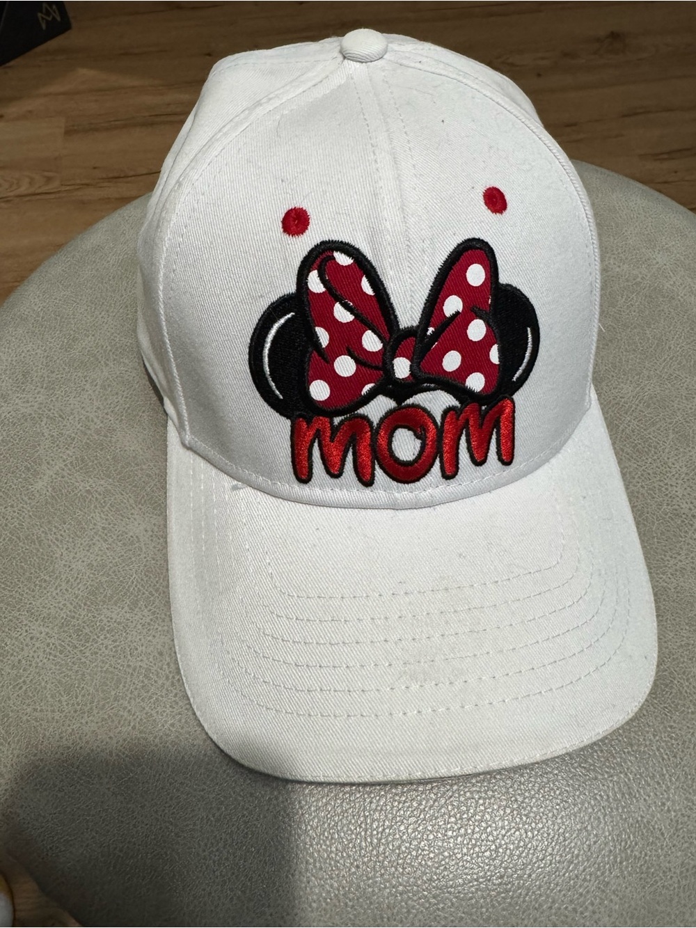 Disney Minnie Mouse Mom Cap with red polka dot bow and 'MOM' text